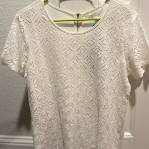 Lace cream top with zipper accent on back